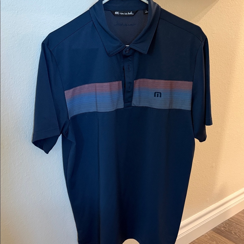 Travis Mathew Navy Polo with Striped Accents